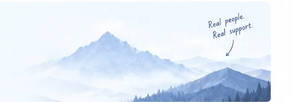 Misty mountain landscape with a handwritten support note